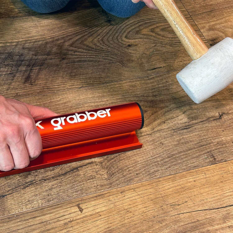 Carica immagine in Galleria Viewer, Floor Fix Pro Plank Grabber Plank Grabber is a tool for fixing gaps in floating floors. It features a &quot;Magic Grip Strip&quot; that sticks to the plank you want to move using nano-suction and without leaving any sticky residue. Plank Grabber can be used to fix
